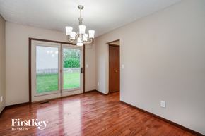 Dublin house for rent - a living room with a door to a yard and a chandelier