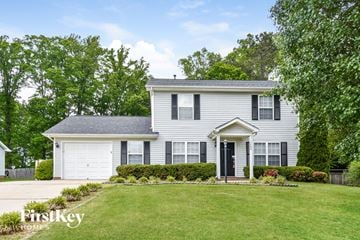 Kernersville house for rent - a white house with black shutters and a lawn