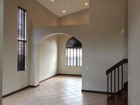 Homestead house for rent - a view of the living room from the staircase