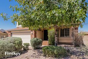 Glendale house for rent - A house with a tree in front of it.