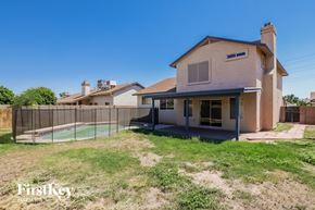 Glendale house for rent - A house with a pool in the backyard.