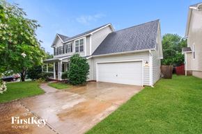 Indian Trail house for rent - a white house with a yard and a driveway