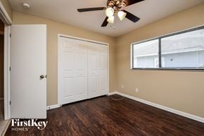 Cape Coral house for rent - the living room of an updated home with a ceiling fan