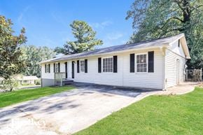 Marietta house for rent - a white house with black shutters and a driveway