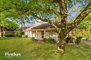 Memphis house for rent - a small house with a tree in front of it