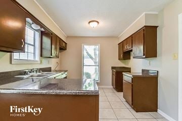 Memphis house for rent - a kitchen with a sink and a window