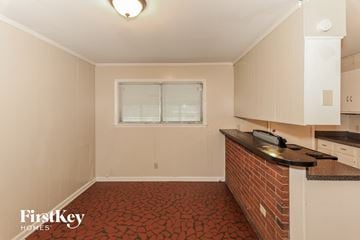 Memphis house for rent - a small kitchen with a counter top and a window