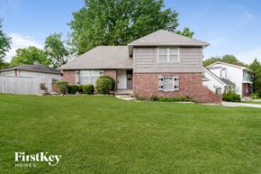 Kansas City house for rent - A house with a lawn in front of it.