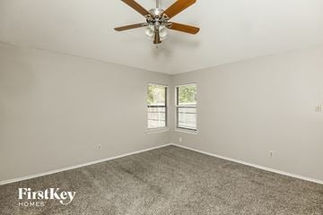Arlington house for rent - the living room has a ceiling fan and carpet