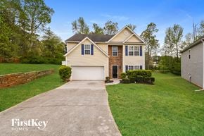 College Park house for rent - A house with a driveway in front of it.