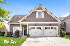 Bessemer house for rent - the front of a house with two garage doors