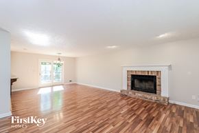 Marietta house for rent - the living room has a fireplace and hardwood floors