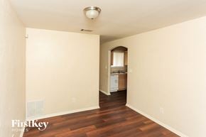 Dallas house for rent - A room with a washer and dryer in it.