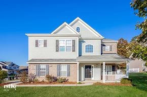 Concord house for rent - a white house with a front porch and a lawn