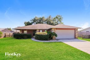 St. Augustine house for rent - A house with a brown roof and a white garage door is for sale.