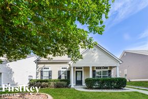 Trussville house for rent - a white house with a tree in front of it