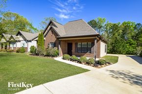 Bessemer house for rent - A house with a driveway in front of it.