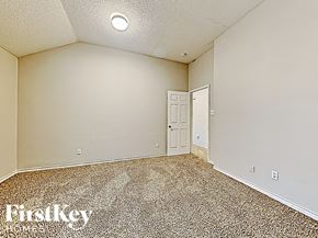Arlington house for rent - the living room is spacious and has a door to the hallway