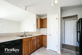 Indianapolis house for rent - A kitchen with a sink and a dishwasher.