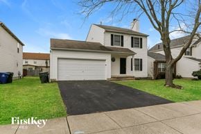 Galloway house for rent - a white house with a white garage door on a driveway