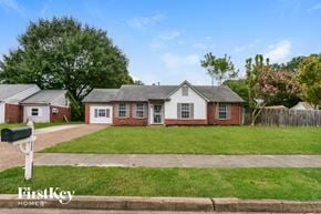 Millington house for rent - A white house with a black mailbox in front of it.