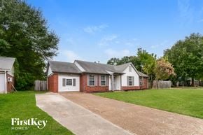 Millington house for rent - A house with a driveway in front of it.