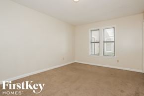Memphis house for rent - a bedroom with a carpeted floor and a window