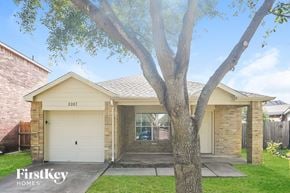 Katy house for rent - A house with a tree in front of it.