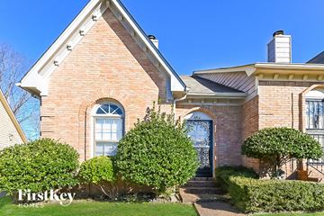 Memphis house for rent - a brick house with a blue sky in the background