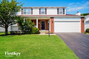 Westerville house for rent - a house with a lawn in front of it