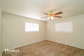 San Antonio house for rent - the master bedroom has carpet and a ceiling fan