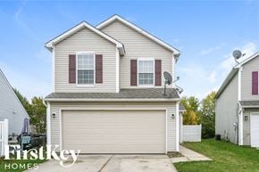 Indianapolis house for rent - a white house with a white garage door