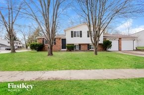 Indianapolis house for rent - A house with a lawn in front of it.