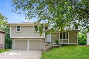 Parkville house for rent - A two-story house with a garage is for sale.