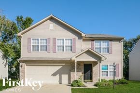 Indianapolis house for rent - A two-story house with a garage is for sale by FirstKey Homes.