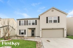 Mccordsville house for rent - A two-story house with a garage is for sale.