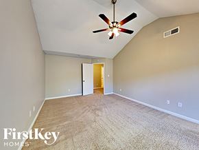 Lithonia house for rent - the master bedroom is spacious and has a ceiling fan