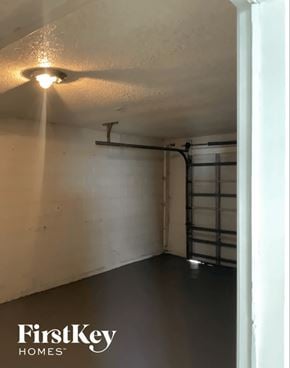 Orlando house for rent - A FirstKey Homes branded empty room with a light on the ceiling.