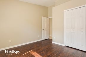Orlando house for rent - a living room with wood floors and white doors