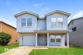 San Antonio house for rent - A two-story house with a garage is for sale.
