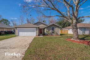 Jacksonville house for rent - A house with a tree in front of it.