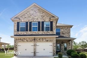 Atlanta house for rent - facade with white garage doors
