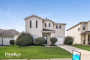 Humble house for rent - A house with a sign that says FirstKey Homes in front of it.