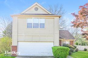 Memphis house for rent - a white house with a white garage door
