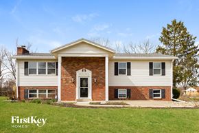 West Chester house for rent - a white house with a blue sky in the background