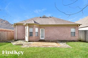 Cordova house for rent - A house with a brick exterior and a white door is for sale.