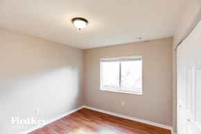 Cutler Bay house for rent - a bedroom with a wood floor and a window