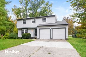 Indianapolis house for rent - A two-story house with a garage is for sale.