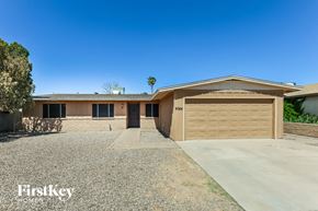 Glendale house for rent - a home with a garage door and a driveway