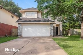 Houston house for rent - a white garage door in front of a house